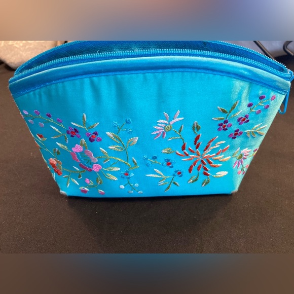 Small Turquoise makeup purse with flower embroidery. - Picture 1 of 7